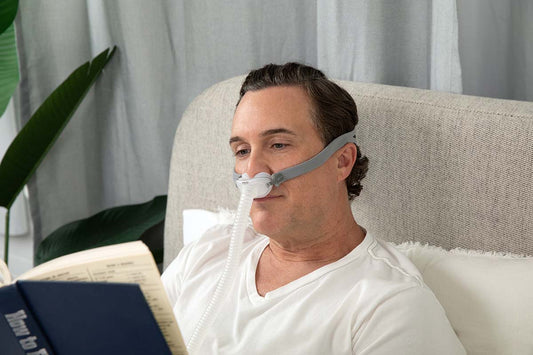 Photo of a man wearing the airfit p10 cpap mask