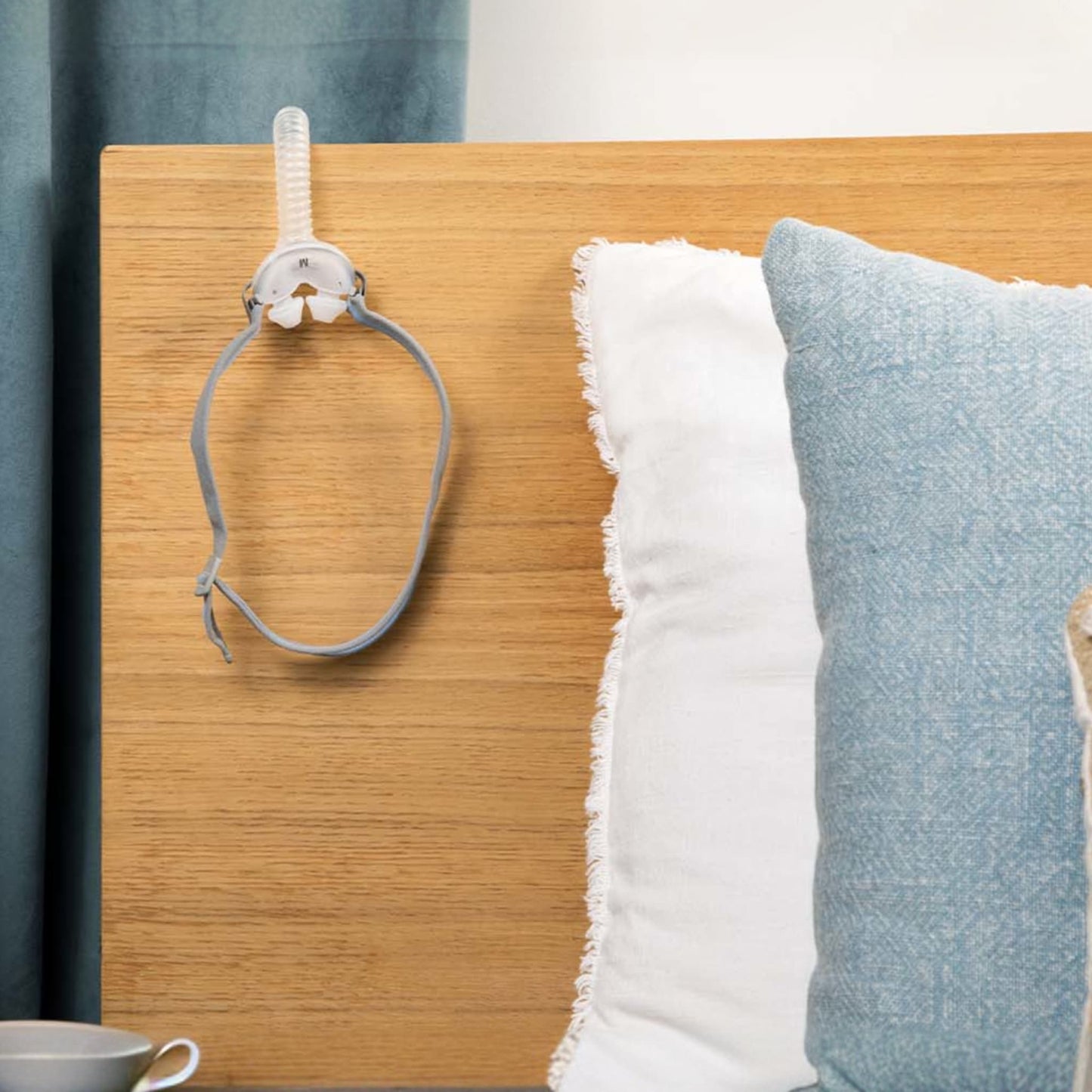 AirFit P10 hanging from headboard